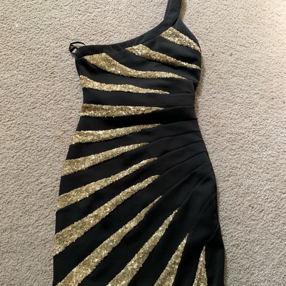 Worn once BEBE one shoulder dress with gold sequin